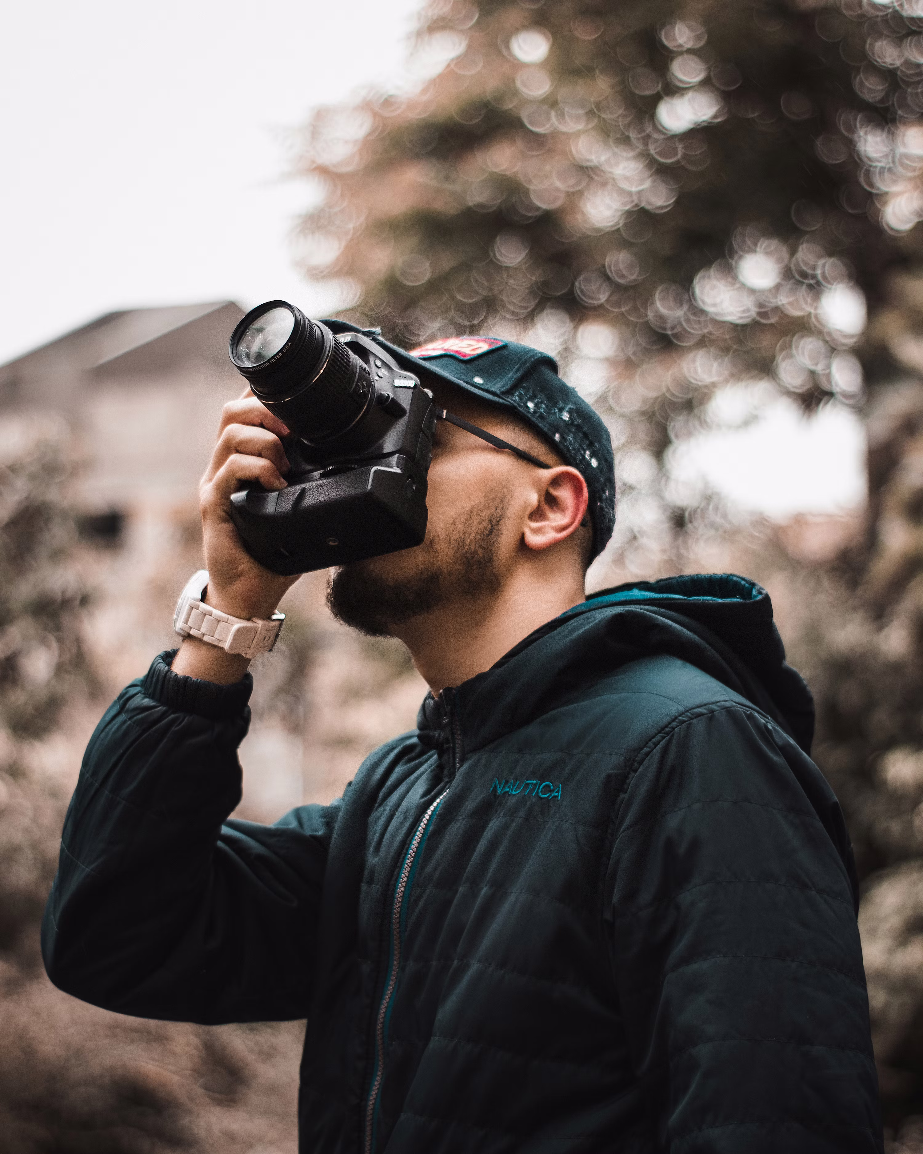 Photographer holding camera